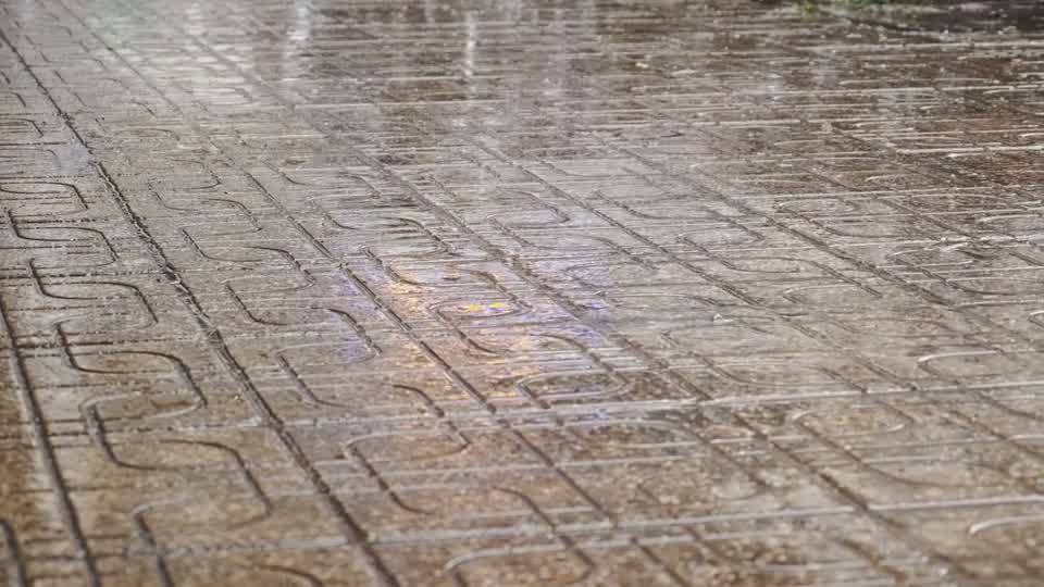 Stamped concrete pattern in rain